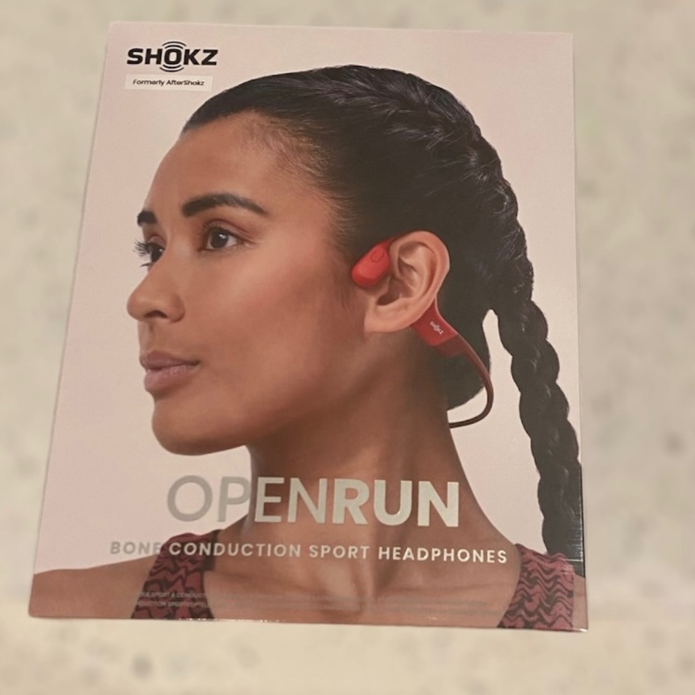 COPY - COPY - COPY - Shokz Bluetooth headset. Red